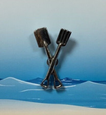 Crossed Pitch Fork And Spade
