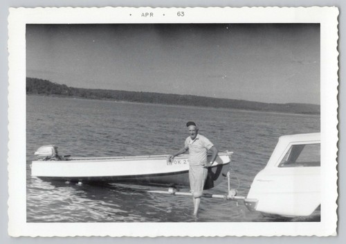 1963 man launching - man, boat