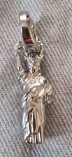Fossil Charm - Statue of