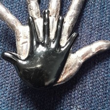 Unique Artistic SILVER Hand and BLACK Hand Pin/Pendant. Plated Metal