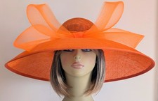 Bright orange sinamay occasion