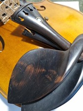 Violin chin rest, pegs, button and tailpiece set all Ebony, naturally shaded 4/4