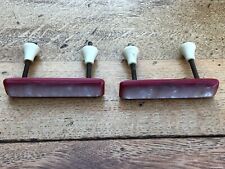 pair of 1950s red and white kitchen cabinet or draw handles ! 