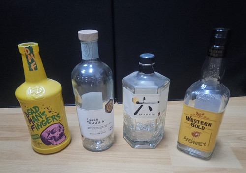 Empty liquor bottles - empty,