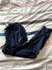 nike academy pants blue and