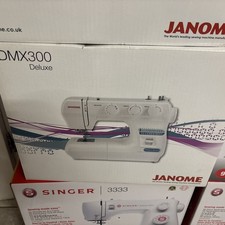 Janome DMX300 De-Luxe  brand