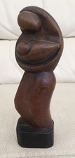 HAND CARVED WOODEN SCULPTURE OF A WOMAN CRADLING A CHILD ?BALI INDONESIA