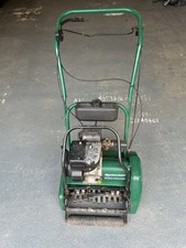 Qualcast Classic 35S Petrol Self-Propelled Mower And Scarifier.