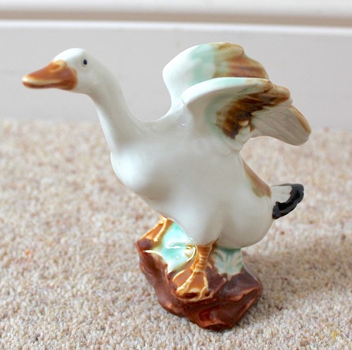 Pottery duck taking flight - duck,
