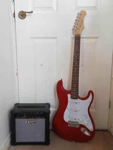 Stagg red electric guitar - , with