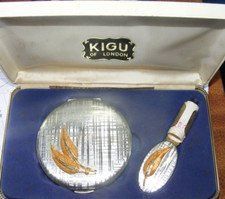 Vintage powder compact & matching lipstick holder by Kigu in original box unused