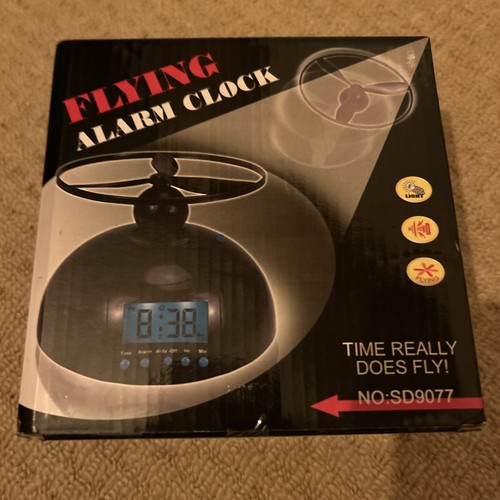 Flying alarm clock helicopter - flying,