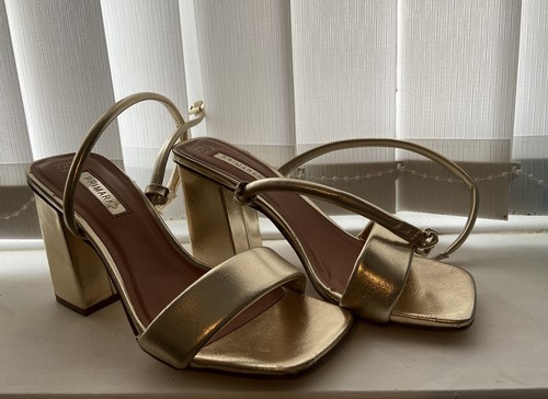 Women size heels gold - 5,