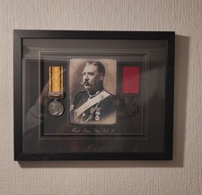 Framed replica Zulu medal