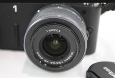 Nikon 1 V1 mirrorless digital camera With 1 Nikkor 1:3.5-5.6 VR 10-30mm lens