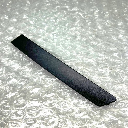 Door card handle trim - card, front