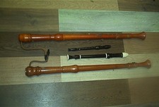 Two bass recorder musical instruments ,one Tenor and one Soprano  as pictured.