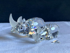 GROUP OF TWO SWAROVSKI RHINOS FOR REPAIR - MOTHER + CALF
