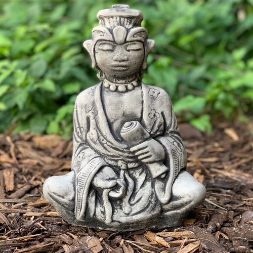 Garden lying lion statue