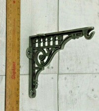 PAIR OF ROMAN HOOK CAST IRON