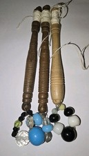 Set of 3 antique lace bobbins with glass spangles – mixed woods