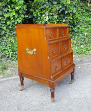 MAHOGANY CAMPAIGN WATERFALL FRONT CHEST OF DRAWERS
