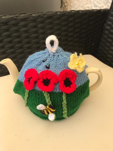 Hand knitted poppy tea cosy - knitted,