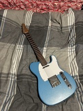 Light blue shiny telecaster