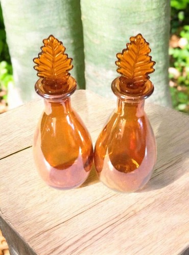 Two rose gold bottles aurora - two,