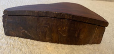 hand carved wooden box in a