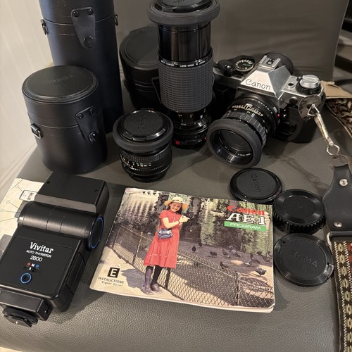 Canon slr camera kit with - ae-1,