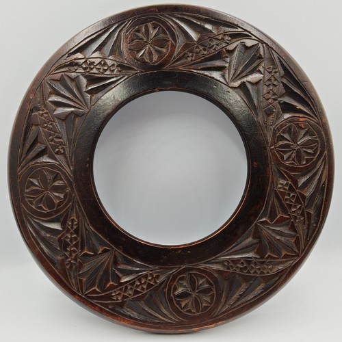 Antique carved wood round