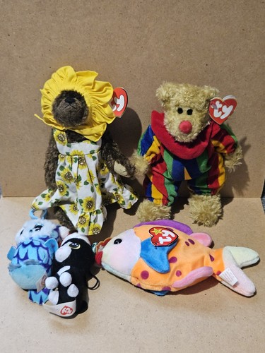 Teddies with tags in - ty,
