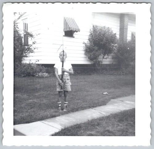 Vtg snapshot boy holding - vtg, b&w