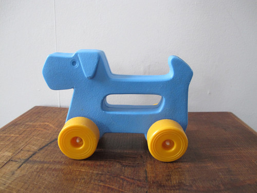 Vintage plastic push along dog