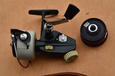 Abu Cardinal 44 Express reel with spare spool and pouch.