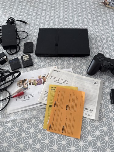 Sony playstation slim - 2,