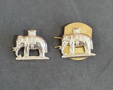 Two Anodised O/R Collar Badges