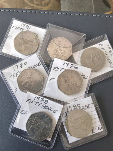 Early large fifty pence - gb,