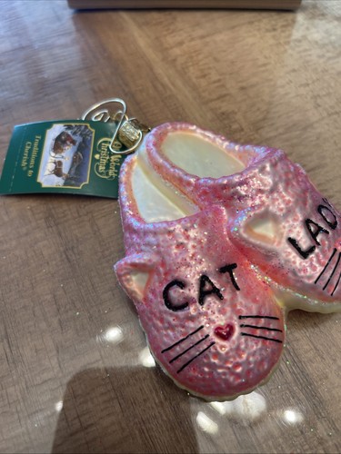 Old world ornament cat lady - world,