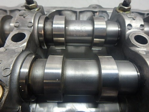 Valve cover with camshafts