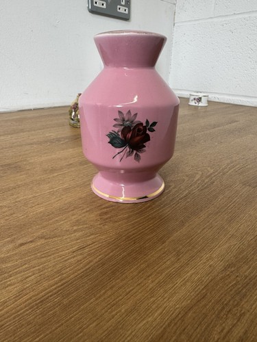 This vintage pink - , vase