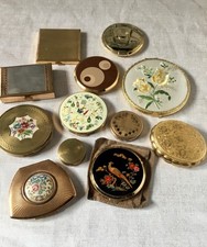 Vintage Compact Collection inc. Stratton. Some mirrors. Some musical.
