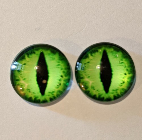 Green glass cabachon eyes