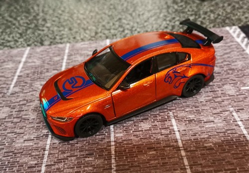 Jaguar orange model car - jaguar,