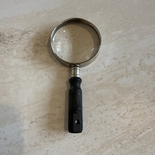 1950s magnifying glass reading - 1950s,