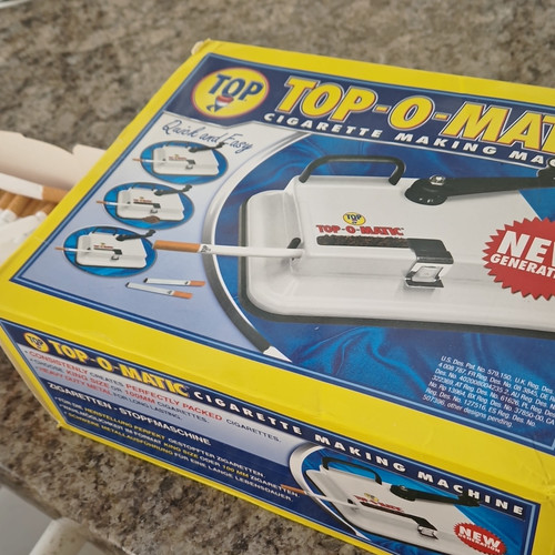 Top matic cigarette - top-o-matic,
