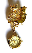 Costume cat brooch with quartz watch.