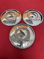 Set of 3 Original Jaguar Hubcaps.