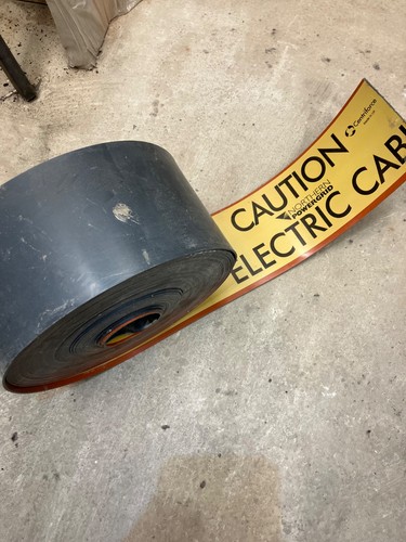 Caution electric cable below - caution,
